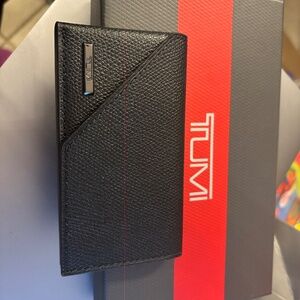TUMI black leather business card case. NIB